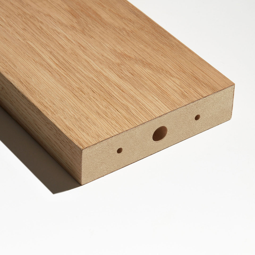 closeup of mdf room divider slats wrapped in real oak veneer against white background