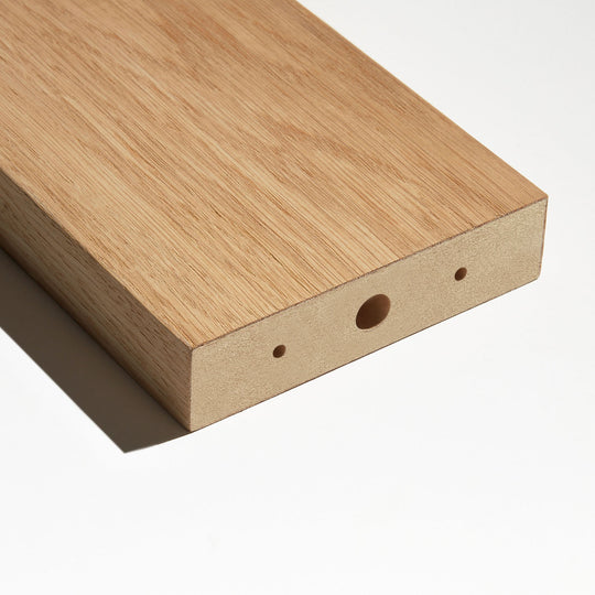 closeup of mdf room divider slats wrapped in real oak veneer against white background