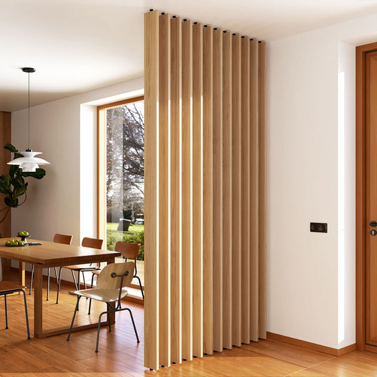 modern european dining room with a vertical rotating wood slat room divider