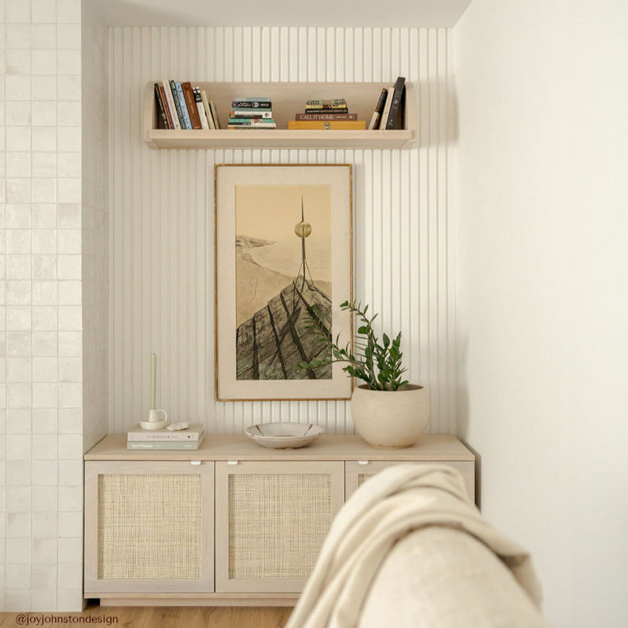 midcentury modern living room with scandi credenza and white slatted panelling on wall