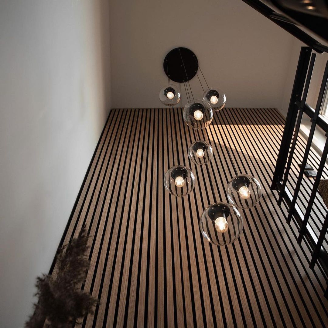 walnut wood slat feature wall in modern home staircase