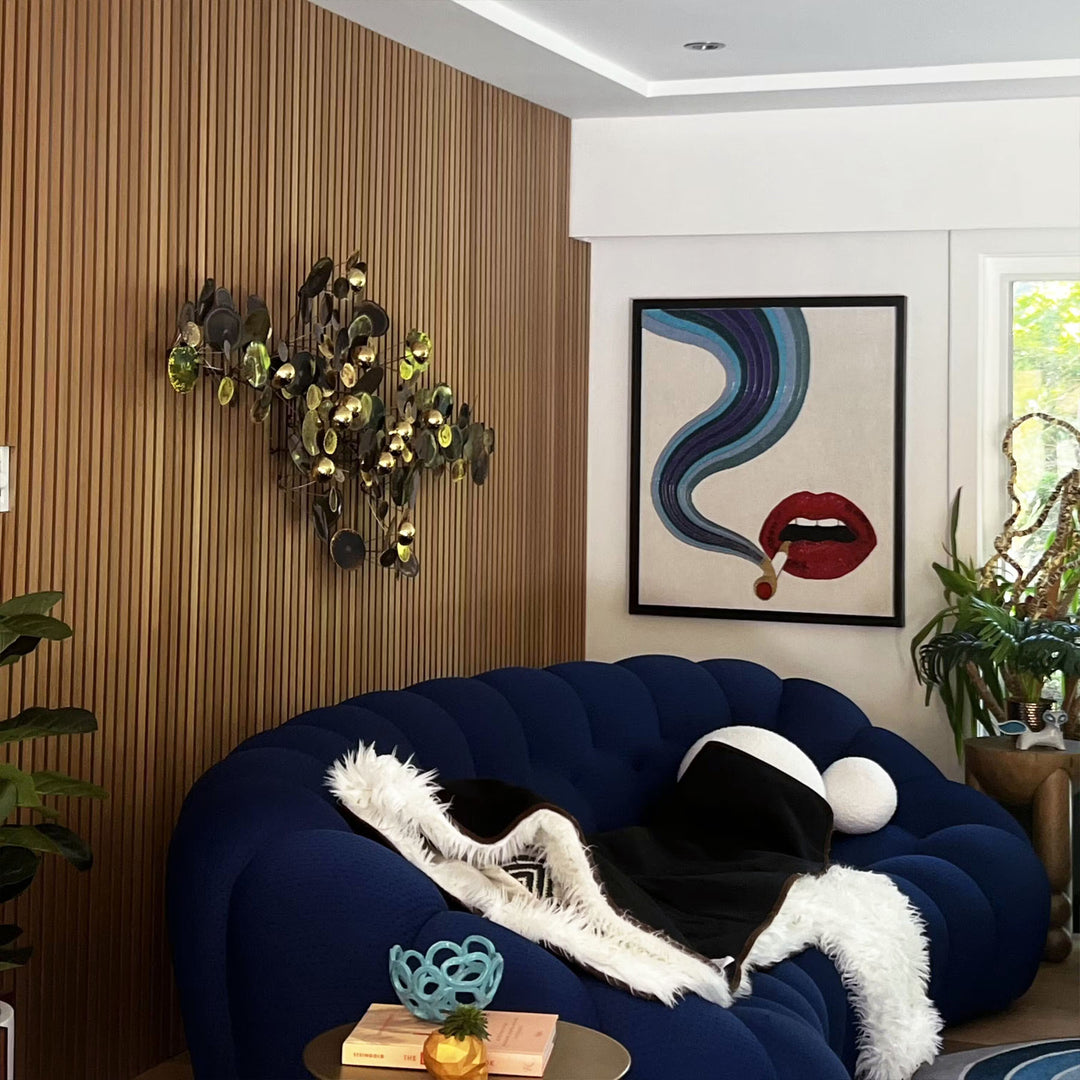 midcentury modern living room with oak wood slat wall paneling behind couch
