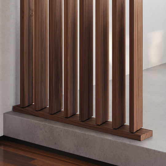 closeup of wood slat room divider with horizontal wooden floor base
