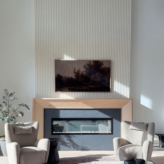 Modern living room with a fireplace, television, and a fluted vertical accent wall.