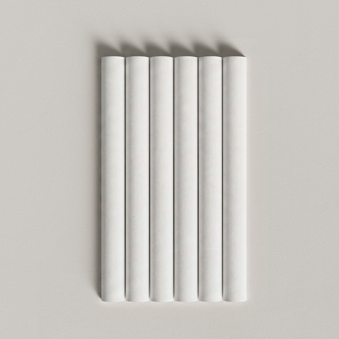 Paintable tambour panel sample on a light gray background.