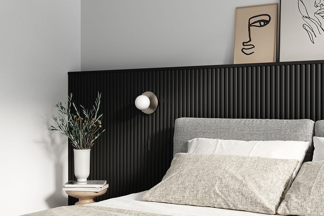 modern bedroom with ribbed black accent halfwall