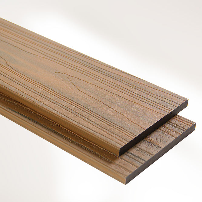 closeup image of wood-look oak composite fascia boards on white background