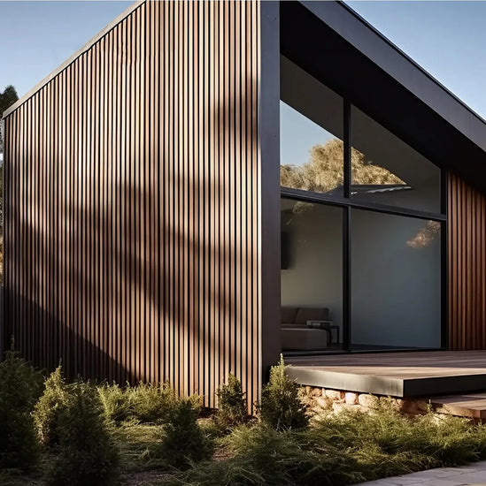 A-frame modern home with exterior wood slat composite panels