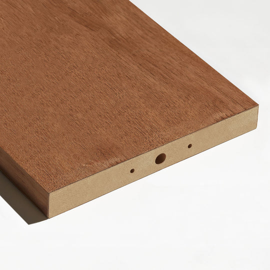 closeup of mdf room divider slats wrapped in real walnut veneer against white background