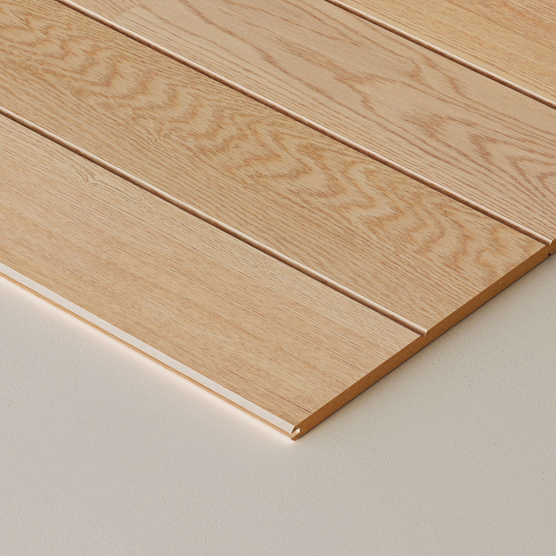 Close-up of wooden wall planks on a neutral background