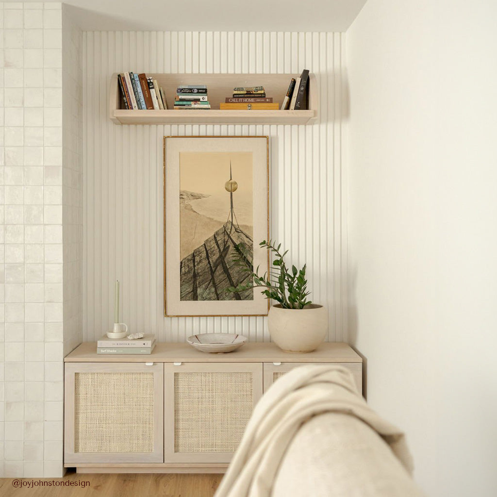 midcentury modern living room with scandi credenza and white slatted panelling on wall