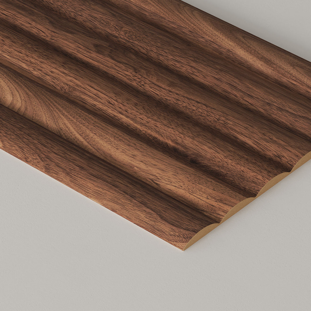 fluted walnut wall paneling on a grey background