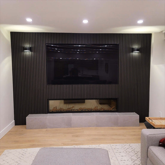 black wood slat wall home theatre with fireplace